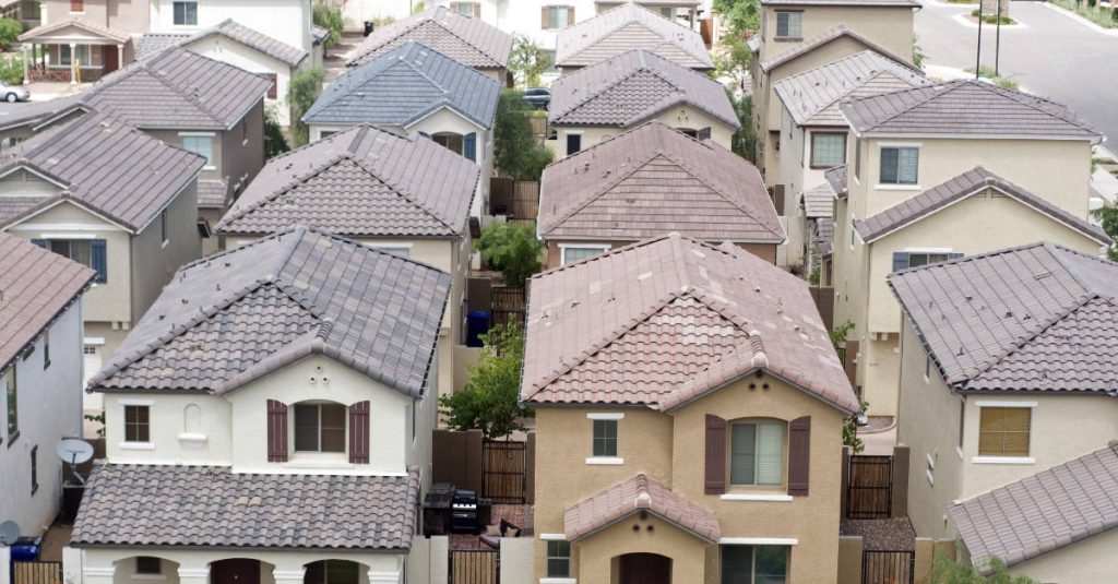 How Long Does a Roof Last - image of multiple roofs in neighborhood.