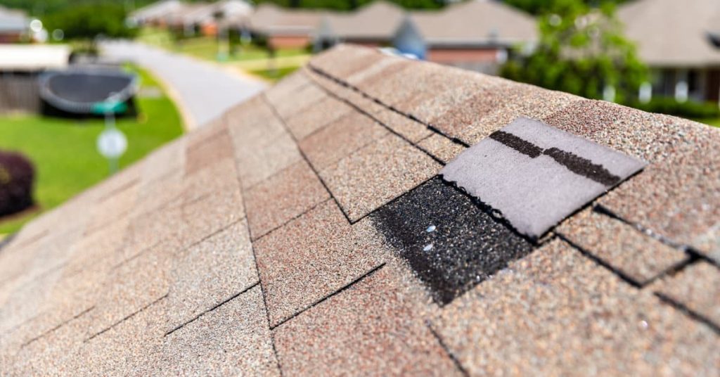 Roof with damaged shingle. Reasons to get roof inspected.