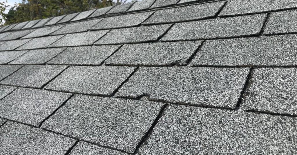 Visible storm damage to shingles