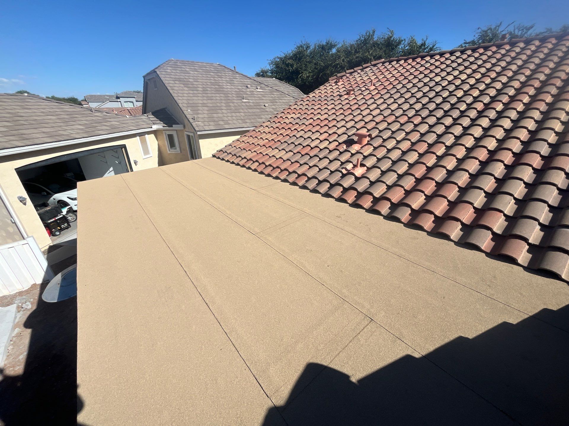 after image of the new flat roof looking towards front of the home