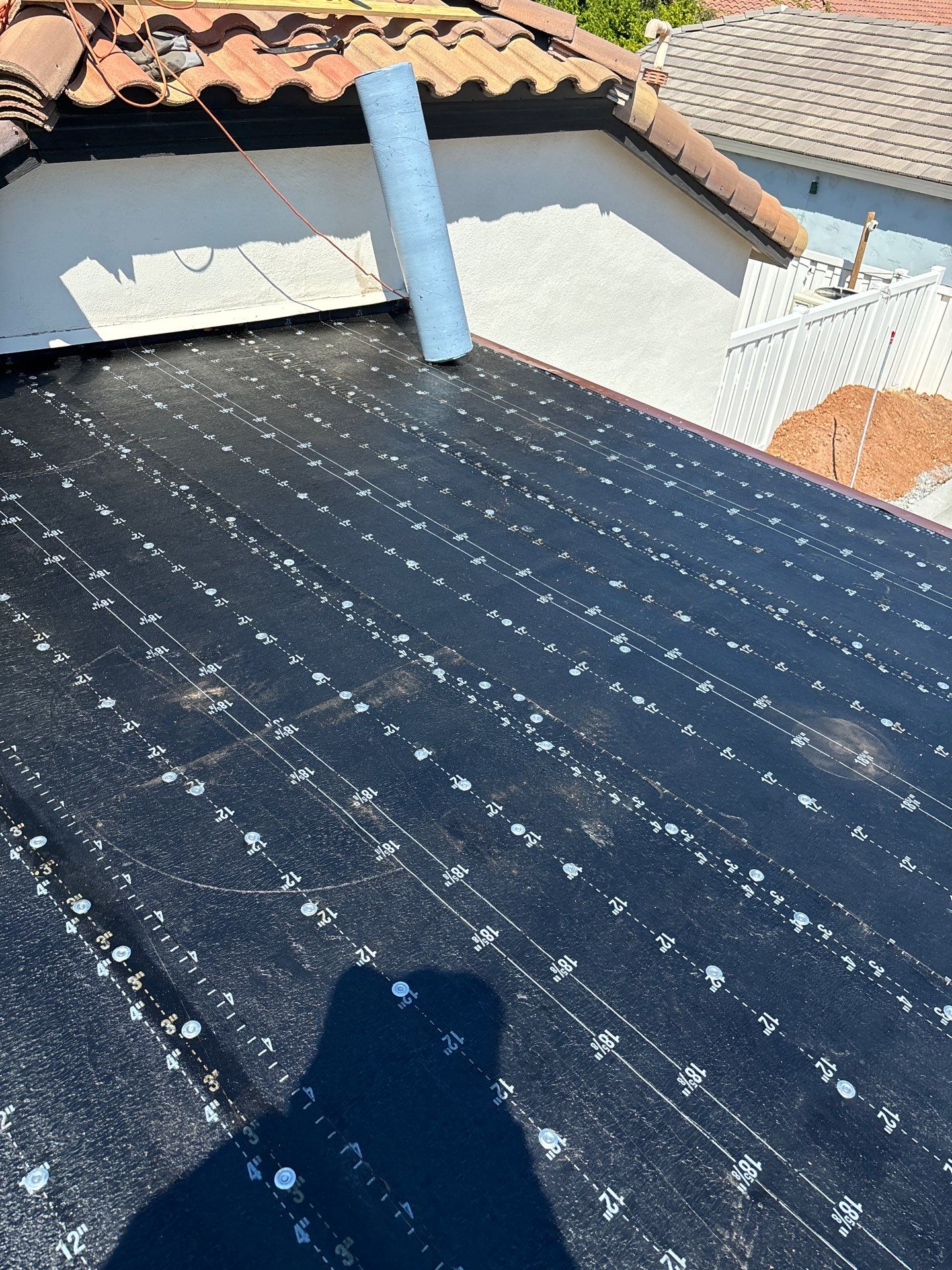 new underlayment on flat roof
