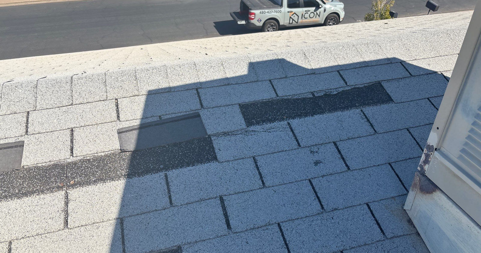 Damaged roof shingles